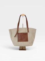 Bolsa Caribbean Beyou Shoes em tecido tramado off white com detalhes e alças em caramelo, estilo casual elegante.