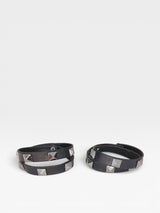 Cinta preta Beyou Shoes com spikes ônix para botas, acessório de estilo moderno e marcante.