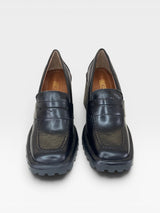 Mocassim Beyou Shoes Trento preto em napa com salto alto tratorado e bico quadrado