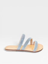 Rasteira Beyou Shoes Cádiz na cor cristal com tiras finas cobertas de brilhos em napa, vista lateral.
