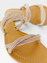 Rasteira Beyou Shoes Jericoacoara nude em napa com tiras delicadas adornadas por pedrarias brilhantes e detalhe em nó