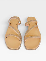 Rasteira Beyou Shoes Udine nude em napa com tiras finas cobertas de brilho e design sofisticado