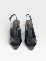 Slingback Beyou Shoes Lugano preta em couro com bico folha e salto alto, vista frontal.
