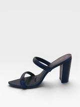 Tamanco Beyou Shoes Montpellier preto em napa com bico folha e salto alto de 10 cm, vista lateral.